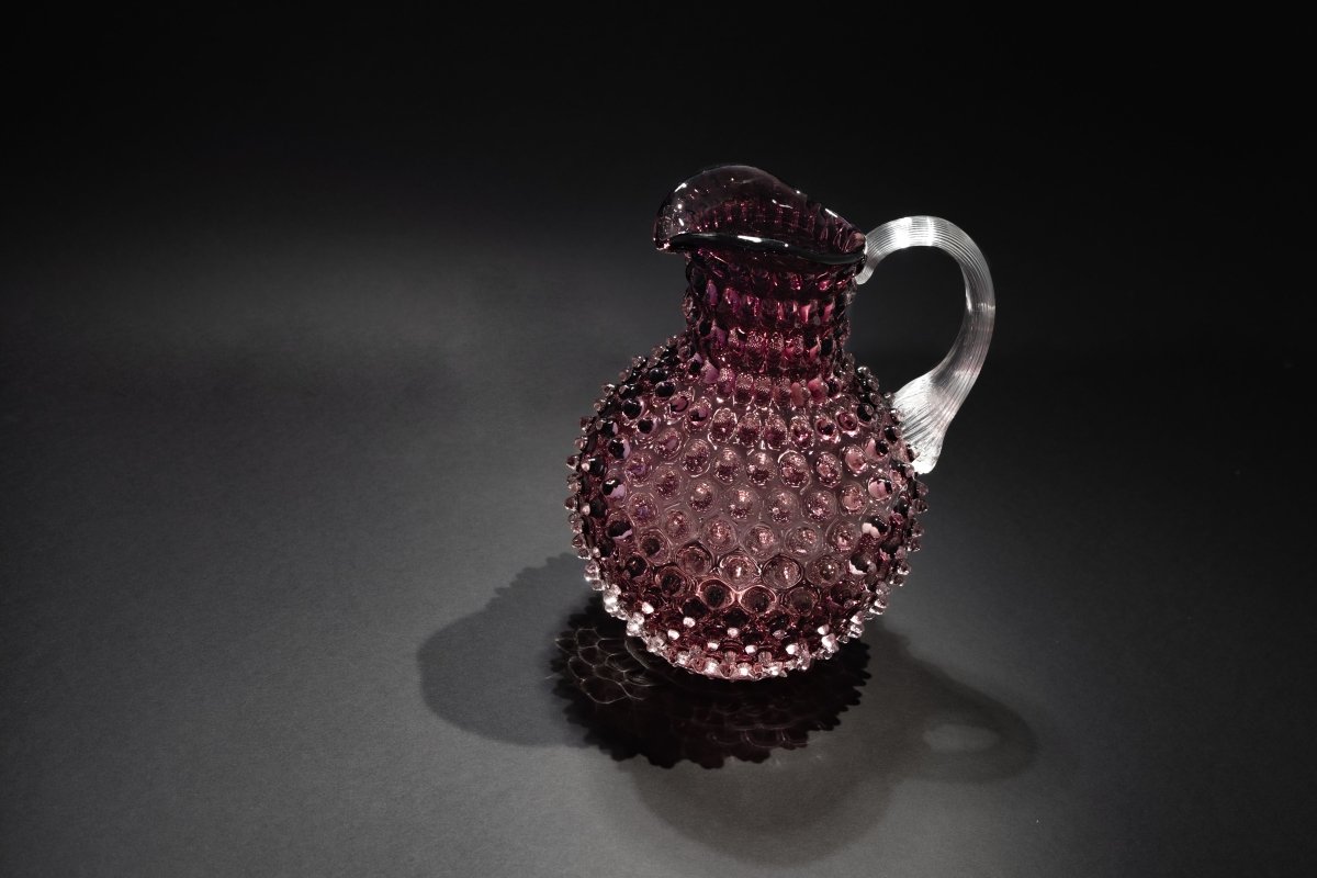 Underlay Violet Hobnail Jug on a black floor 