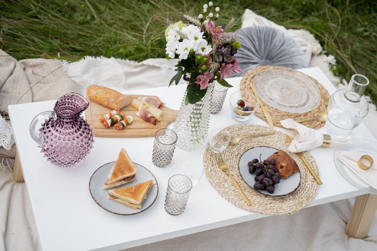 Underlay Violet Hobnail Jug on a white table at a brunch in the park 